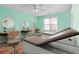 Mint-colored salon with styling stations and massage tables at 337 N Clayton St, Lawrenceville, GA 30046