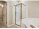 Bathroom with shower and tub at 780 Treadstone Ct, Suwanee, GA 30024