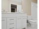 Bathroom with double vanity and shower/tub combo at 780 Treadstone Ct, Suwanee, GA 30024