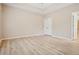 Bright bedroom with hardwood floors and double door closet at 780 Treadstone Ct, Suwanee, GA 30024