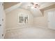 Bedroom with window, ceiling fan, and neutral decor at 780 Treadstone Ct, Suwanee, GA 30024