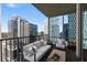 Private balcony with city views and seating area at 20 10Th Nw St # 2104, Atlanta, GA 30309