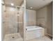 Spa-like bathroom with soaking tub and glass shower at 20 10Th Nw St # 2104, Atlanta, GA 30309