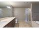 Modern bathroom with double vanity and large shower at 20 10Th Nw St # 2104, Atlanta, GA 30309