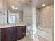 Modern bathroom with glass shower and mosaic tile at 20 10Th Nw St # 2104, Atlanta, GA 30309
