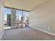 Spacious bedroom with large windows and city views at 20 10Th Nw St # 2104, Atlanta, GA 30309