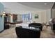 Spacious common area with comfortable seating and city views at 20 10Th Nw St # 2104, Atlanta, GA 30309