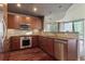 Modern kitchen with stainless steel appliances and granite countertops at 20 10Th Nw St # 2104, Atlanta, GA 30309