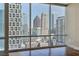 Stunning city views from large windows in living room at 20 10Th Nw St # 2104, Atlanta, GA 30309
