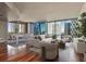 Spacious living room with hardwood floors and city views at 20 10Th Nw St # 2104, Atlanta, GA 30309