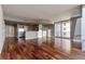 Open living space with hardwood floors and access to balcony at 20 10Th Nw St # 2104, Atlanta, GA 30309