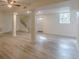 Spacious finished basement with LVP flooring and ceiling fan at 1707 Boulderview Se Dr, Atlanta, GA 30316