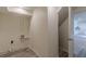Basement laundry room with access to kitchen at 1707 Boulderview Se Dr, Atlanta, GA 30316