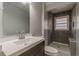 Modern bathroom with a shower, toilet and vanity at 1707 Boulderview Se Dr, Atlanta, GA 30316