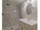 Modern bathroom with marble-look shower and vanity at 1707 Boulderview Se Dr, Atlanta, GA 30316