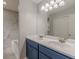 Bathroom with double vanity and marble tile at 1707 Boulderview Se Dr, Atlanta, GA 30316