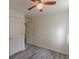 Bedroom with ceiling fan, closet and door to hallway at 1707 Boulderview Se Dr, Atlanta, GA 30316