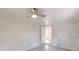 Bedroom featuring white painted brick wall and hardwood floors at 1707 Boulderview Se Dr, Atlanta, GA 30316