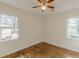 Spacious bedroom with hardwood floors and ceiling fan at 1707 Boulderview Se Dr, Atlanta, GA 30316