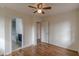 Hardwood floor bedroom with access to bathroom at 1707 Boulderview Se Dr, Atlanta, GA 30316