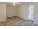 Bright bedroom with LVP flooring and ceiling fan at 1707 Boulderview Se Dr, Atlanta, GA 30316