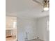 Bedroom with white painted brick accent wall and ceiling fan at 1707 Boulderview Se Dr, Atlanta, GA 30316