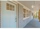 Light blue front door with a stylish glass window insert at 1707 Boulderview Se Dr, Atlanta, GA 30316