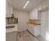 Modern kitchen with white cabinets and butcher block counters at 1707 Boulderview Se Dr, Atlanta, GA 30316