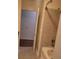 Bathroom featuring tile surround, shower head, faucet, and tiled floor at 250 Pharr Ne Rd # 1704, Atlanta, GA 30305