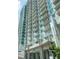 Modern high-rise building with numerous balconies and city views at 250 Pharr Ne Rd # 1704, Atlanta, GA 30305