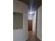 Hallway featuring wood-look floors and modern architecture at 250 Pharr Ne Rd # 1704, Atlanta, GA 30305