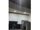 Modern kitchen features stainless steel appliances, black backsplash, and ample cabinet space at 250 Pharr Ne Rd # 1704, Atlanta, GA 30305