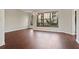 Spacious living room with hardwood floors and large windows at 898 Oak St # 2003, Atlanta, GA 30310