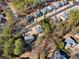 Aerial view of house and surrounding trees at 115 Parkside Close, Alpharetta, GA 30022