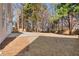 Private backyard with patio and mature trees at 115 Parkside Close, Alpharetta, GA 30022