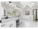 Elegant bathroom with double vanity, soaking tub, and frameless shower at 115 Parkside Close, Alpharetta, GA 30022