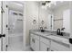 Modern bathroom with double vanity, granite countertop, and shower/tub combo at 115 Parkside Close, Alpharetta, GA 30022