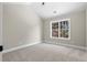 Spacious bedroom with high ceiling and a large window at 115 Parkside Close, Alpharetta, GA 30022