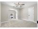 Charming bedroom with window, closet, and ceiling fan at 115 Parkside Close, Alpharetta, GA 30022