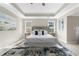 Spacious primary bedroom with high ceilings, large windows, and plush carpet at 115 Parkside Close, Alpharetta, GA 30022