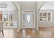 Bright and spacious entryway with hardwood floors and natural light at 115 Parkside Close, Alpharetta, GA 30022