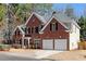Two-story home with a large backyard and double garage at 115 Parkside Close, Alpharetta, GA 30022