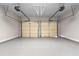 Two-car garage with automatic door openers at 115 Parkside Close, Alpharetta, GA 30022