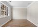 Bright home office with hardwood floors and large window at 115 Parkside Close, Alpharetta, GA 30022