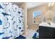 Bathroom with shower/tub combo and shark theme at 117 Gloster Mill Way, Lawrenceville, GA 30044