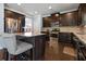 Island kitchen with granite countertops and stainless steel appliances at 117 Gloster Mill Way, Lawrenceville, GA 30044