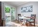 Cozy dining area with a view to the backyard through sliding glass doors at 118 Lucia Se Dr, Smyrna, GA 30082