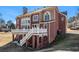 Brick home with large deck and landscaped yard at 715 Jewel Sw Ct, Atlanta, GA 30331