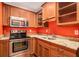 Small kitchen with granite countertops and stainless steel appliances at 715 Jewel Sw Ct, Atlanta, GA 30331