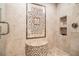 Walk-in shower with mosaic tile and built-in bench at 715 Jewel Sw Ct, Atlanta, GA 30331